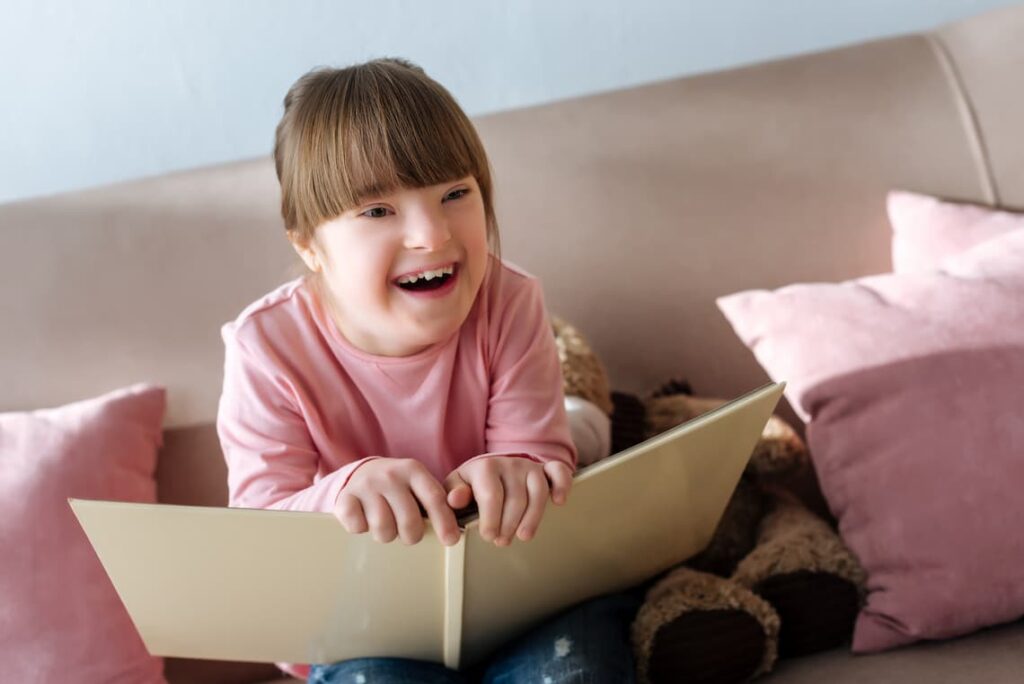 criança com síndrome de down não gosta de livros