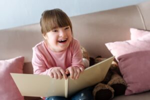 criança com síndrome de down não gosta de livros